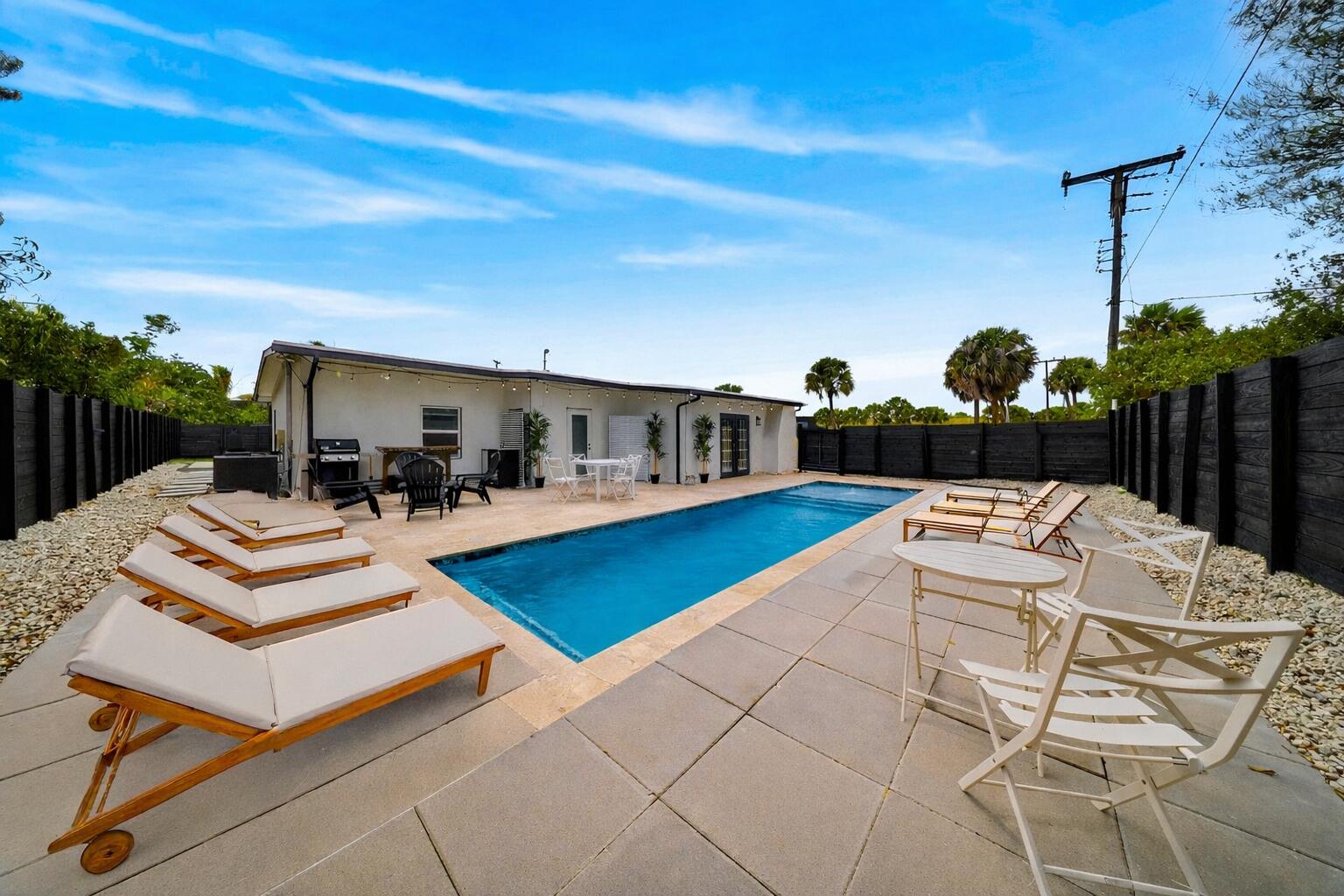 801 Southeast 15th Street Stuart, FL 34994 - Photo 21 of 25 a view of a patio with swimming pool