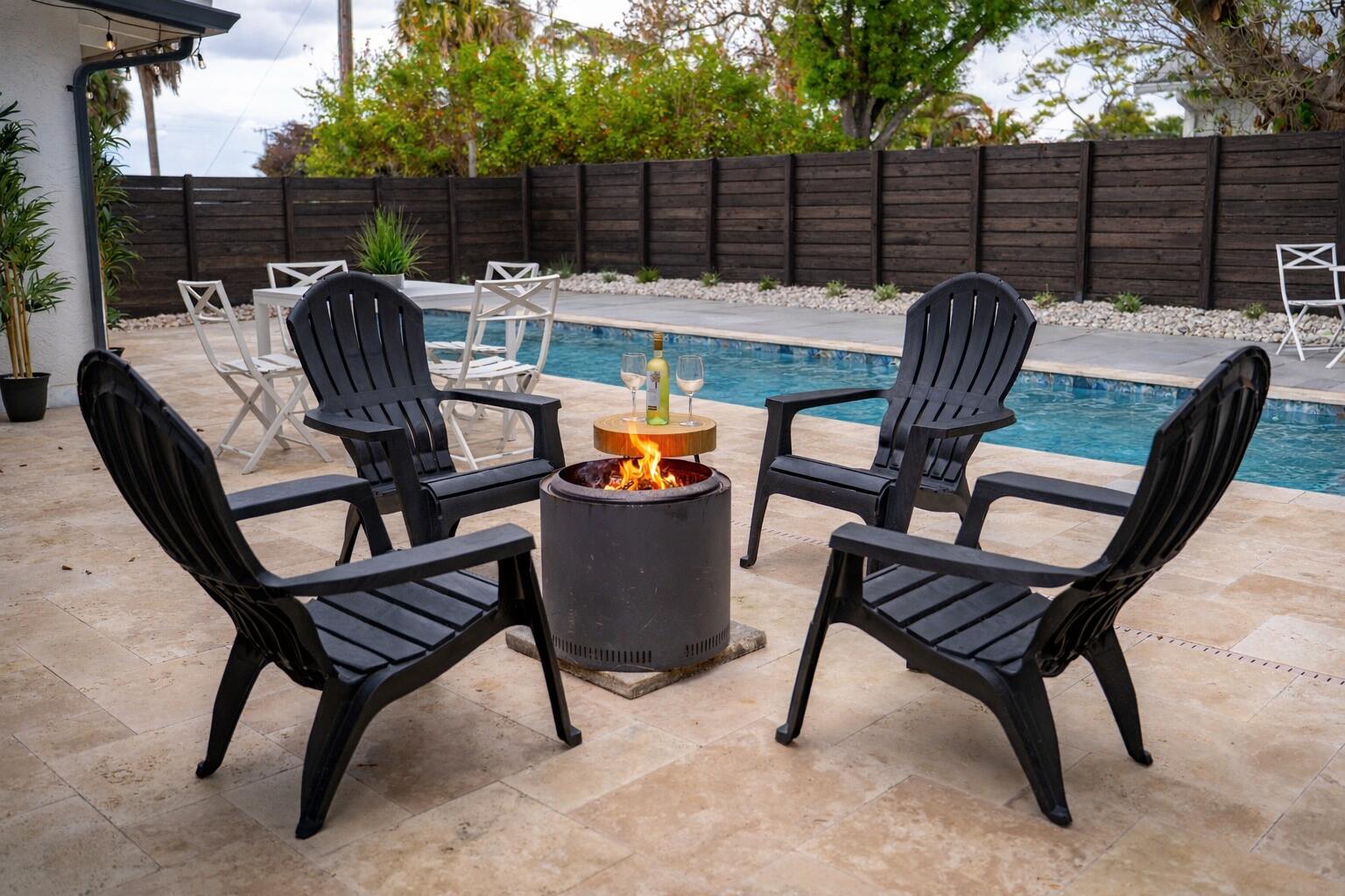 801 Southeast 15th Street Stuart, FL 34994 - Photo 23 of 25 a view of backyard with outdoor seating and trees