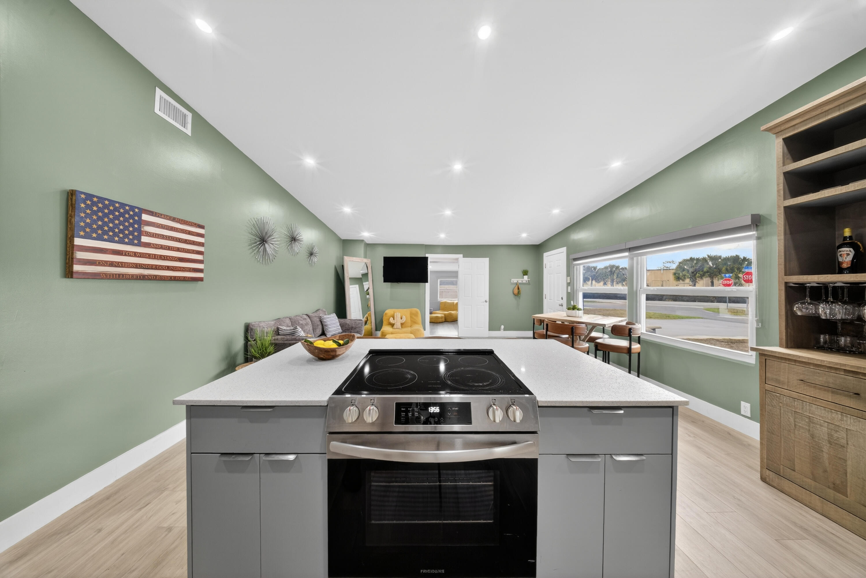 801 Southeast 15th Street Stuart, FL 34994 - Photo 4 of 25 a kitchen with stove and cabinets