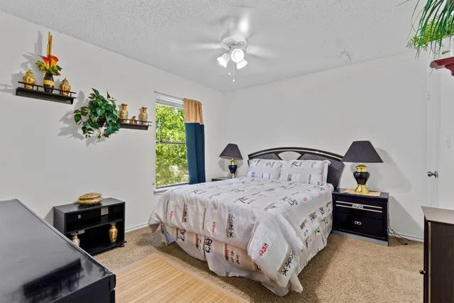 a bathroom with a sink and mirror with toilet