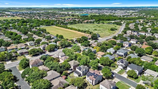 an aerial view of a city with lots of residential buildings