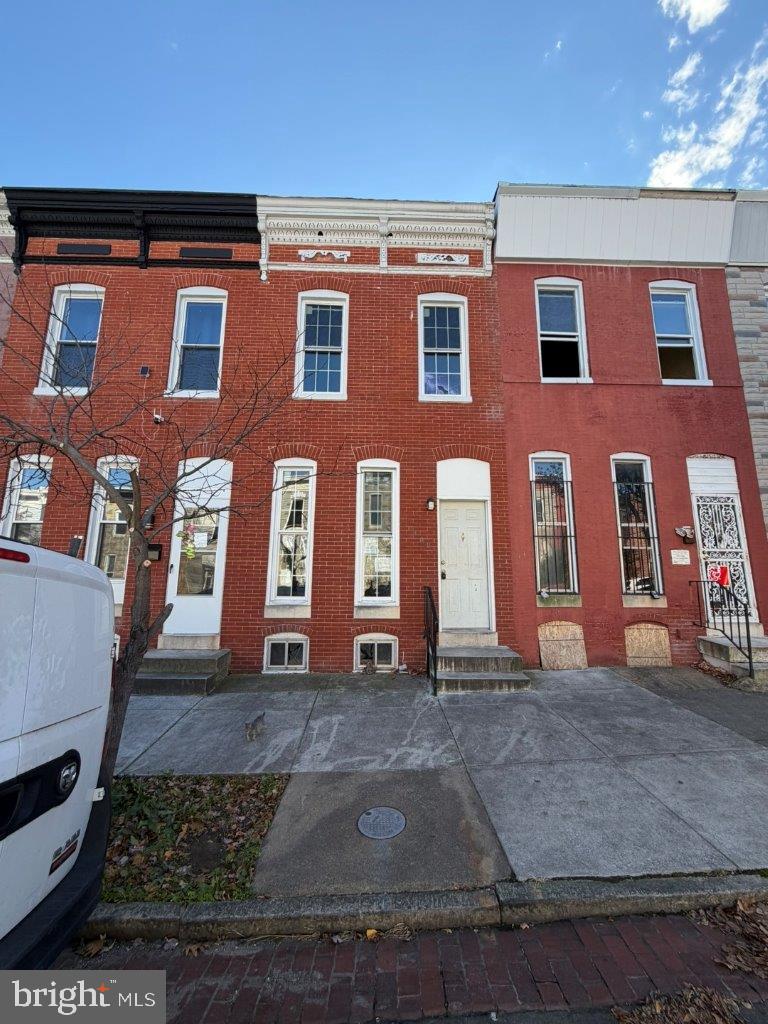 1409 East Lanvale Street Baltimore, MD 21213 - Photo 1 of 25 a front view of a building