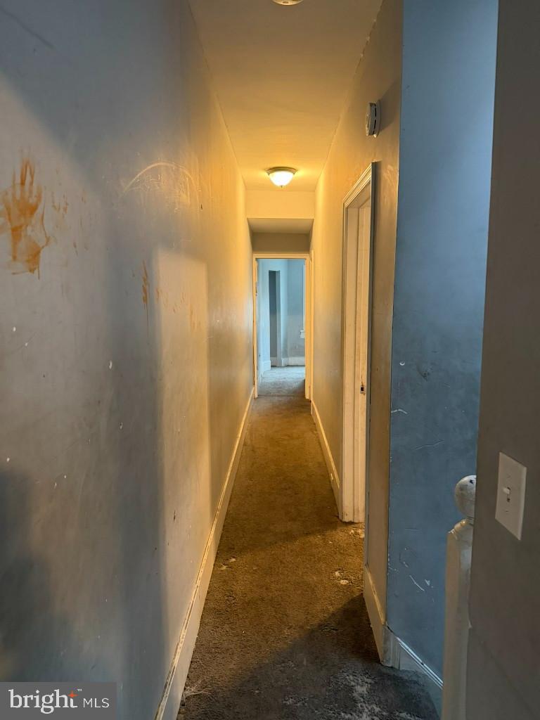 1409 East Lanvale Street Baltimore, MD 21213 - Photo 15 of 25 a view of a bathroom from a hallway