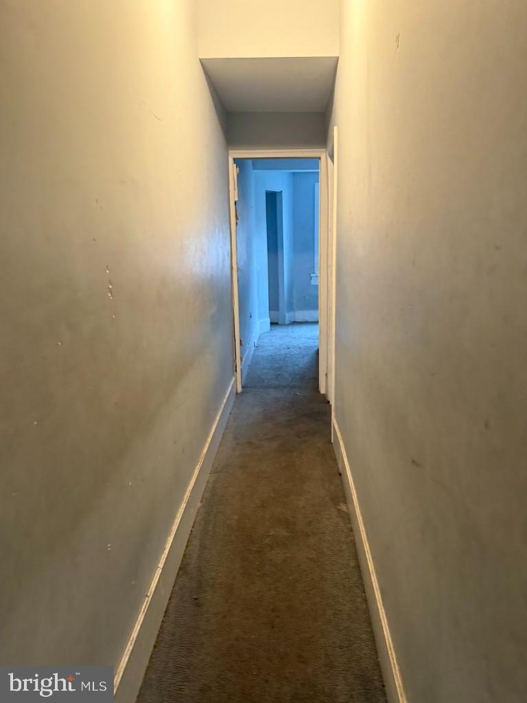 1409 East Lanvale Street Baltimore, MD 21213 - Photo 19 of 25 a view of a hallway