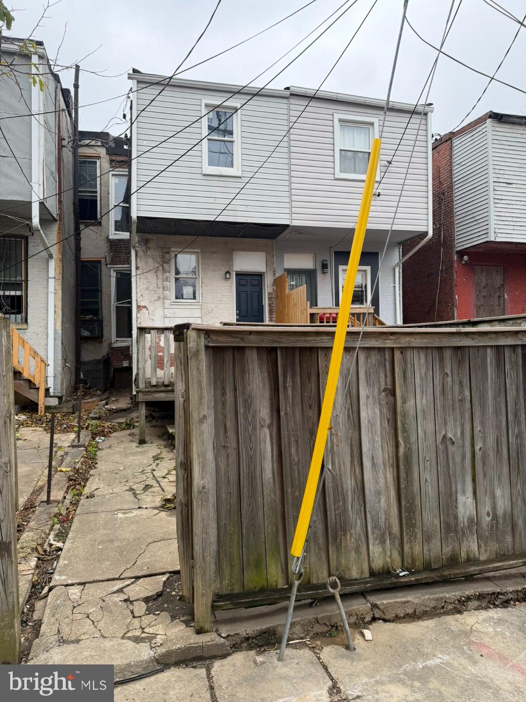 1409 East Lanvale Street Baltimore, MD 21213 - Photo 25 of 25 a view of a house with a wooden deck