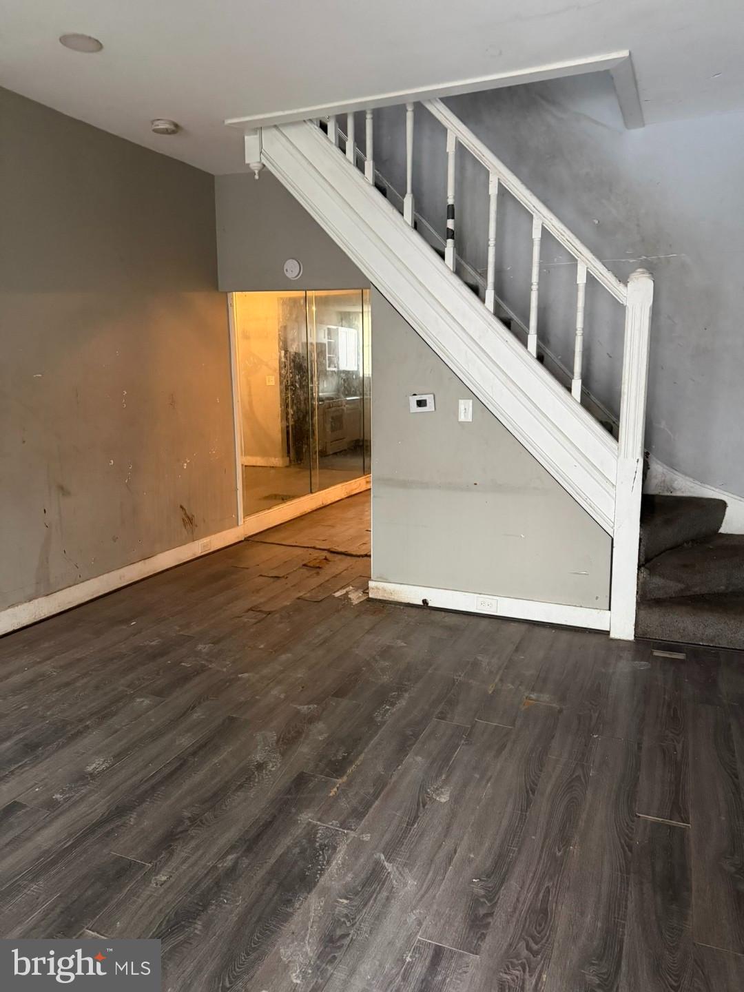1409 East Lanvale Street Baltimore, MD 21213 - Photo 3 of 25 a view of an entryway with wooden floor