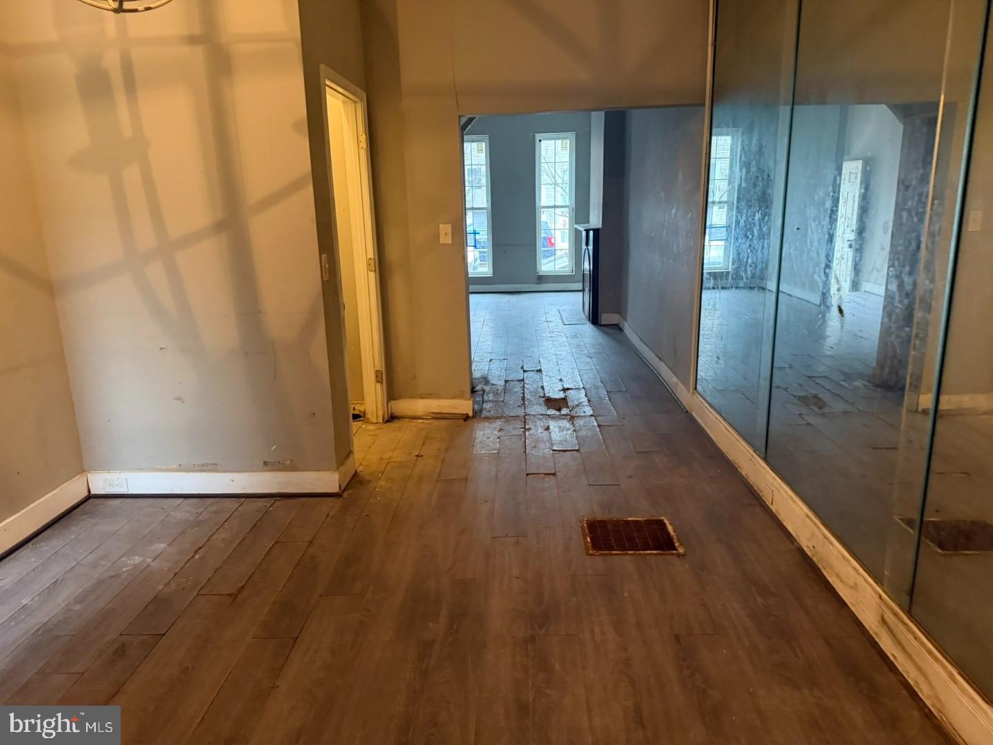 1409 East Lanvale Street Baltimore, MD 21213 - Photo 9 of 25 wooden floor in a gallery