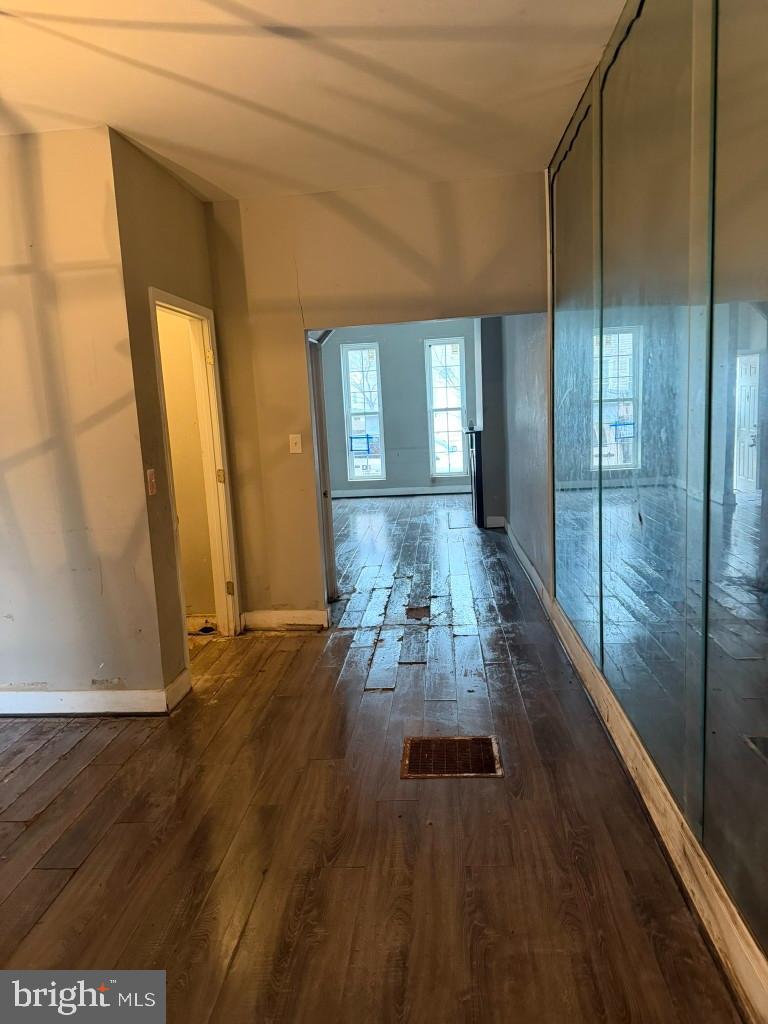 1409 East Lanvale Street Baltimore, MD 21213 - Photo 10 of 25 a view of gallery with wooden floor