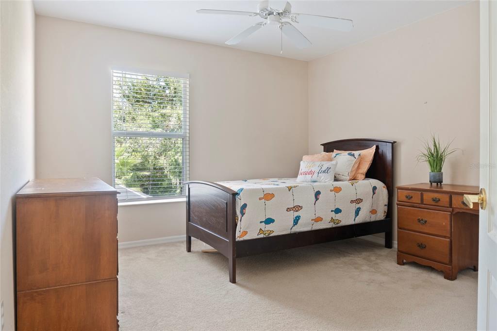 8746 Stone Harbour Loop Bradenton, FL 34212 - Photo 36 of 71 a bedroom with a bed and window