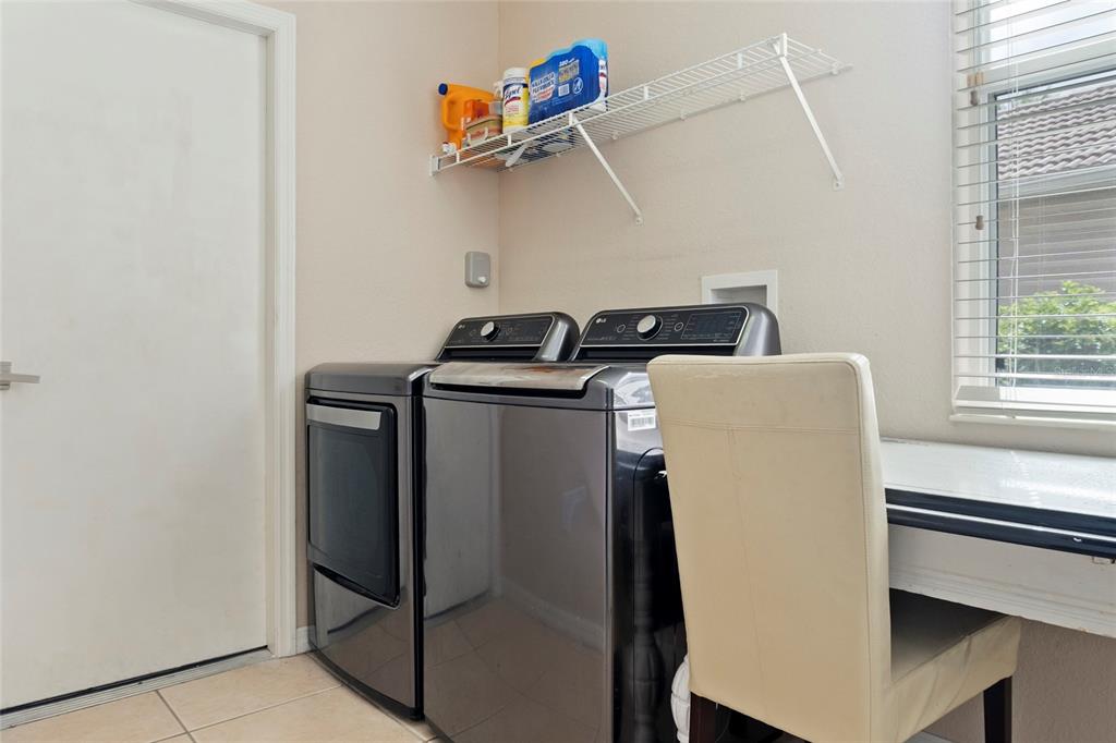 8746 Stone Harbour Loop Bradenton, FL 34212 - Photo 40 of 71 a utility room with dryer and washer