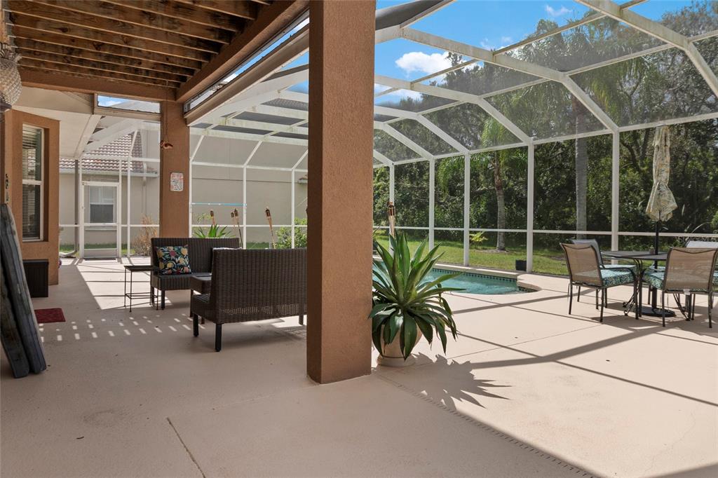 8746 Stone Harbour Loop Bradenton, FL 34212 - Photo 42 of 71 a view of a chairs and table in a patio