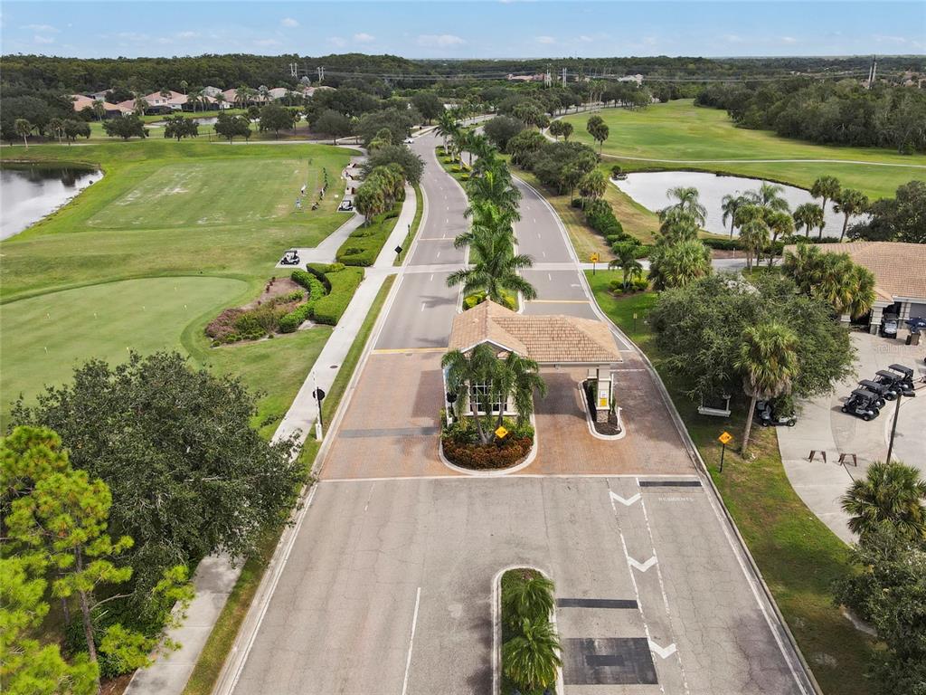 8746 Stone Harbour Loop Bradenton, FL 34212 - Photo 50 of 71 an aerial view of a house with a lake view
