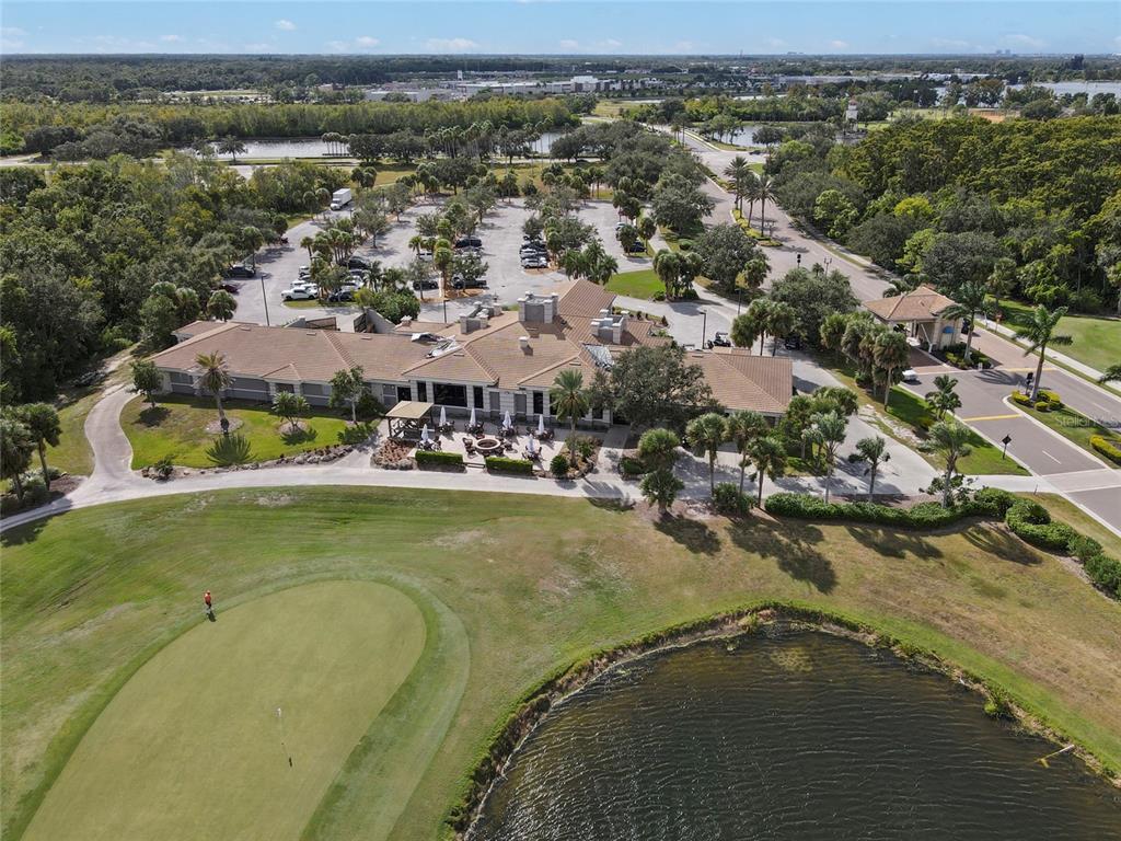 8746 Stone Harbour Loop Bradenton, FL 34212 - Photo 52 of 71 an aerial view of residential houses with outdoor space and river