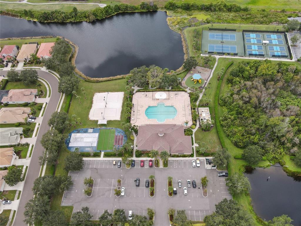 8746 Stone Harbour Loop Bradenton, FL 34212 - Photo 55 of 71 an aerial view of a house with outdoor space and a lake view