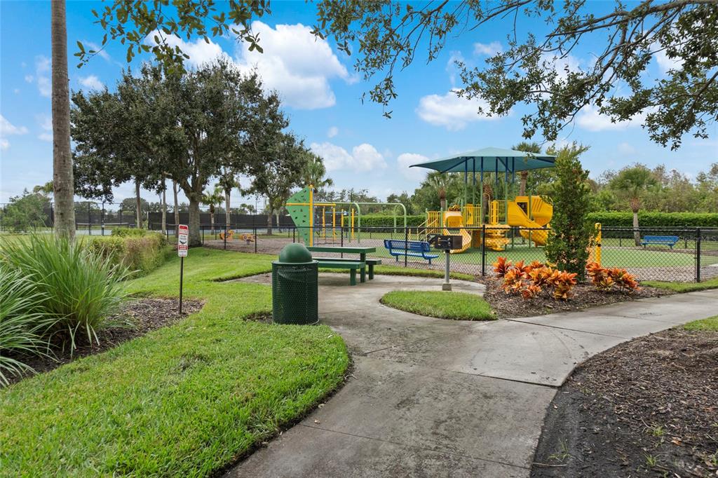 8746 Stone Harbour Loop Bradenton, FL 34212 - Photo 68 of 71 a view of a park with large trees