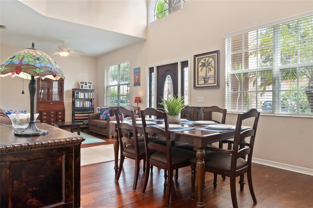 8746 Stone Harbour Loop Bradenton, FL 34212 - Photo 7 of 71 a view of a dining room with furniture window and outside view