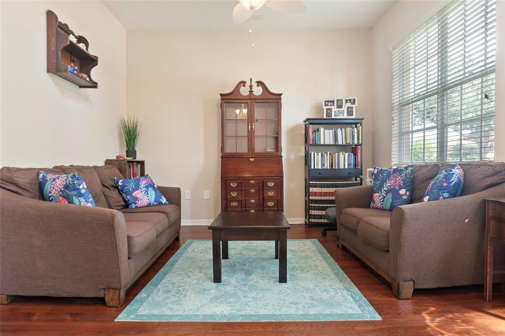 8746 Stone Harbour Loop Bradenton, FL 34212 - Photo 9 of 71 a living room with furniture and a rug