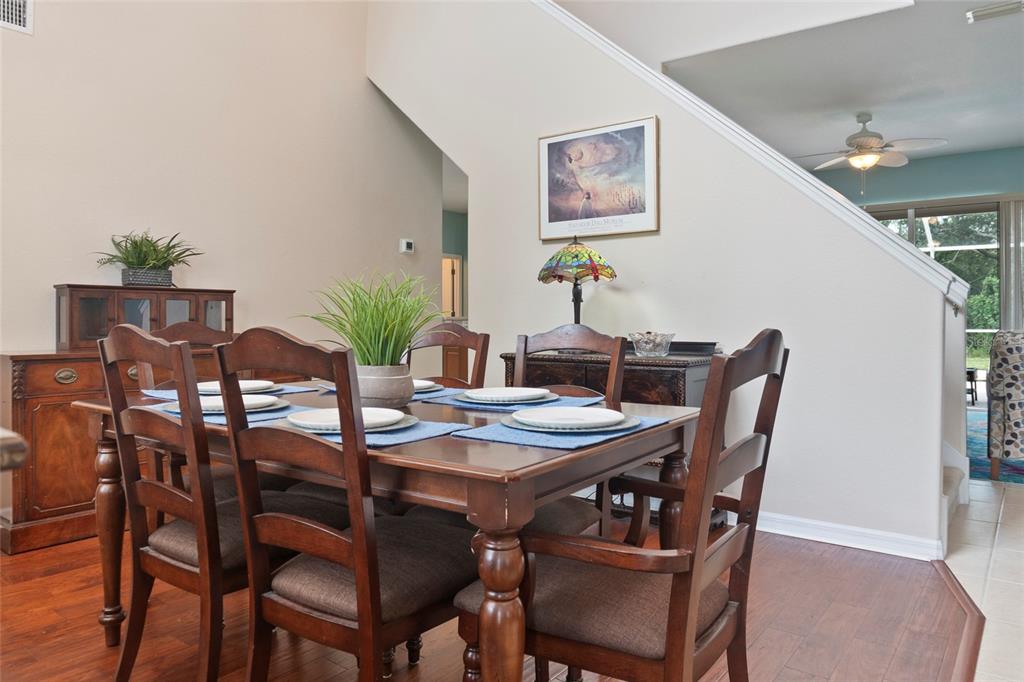 8746 Stone Harbour Loop Bradenton, FL 34212 - Photo 10 of 71 a view of a dining room with furniture
