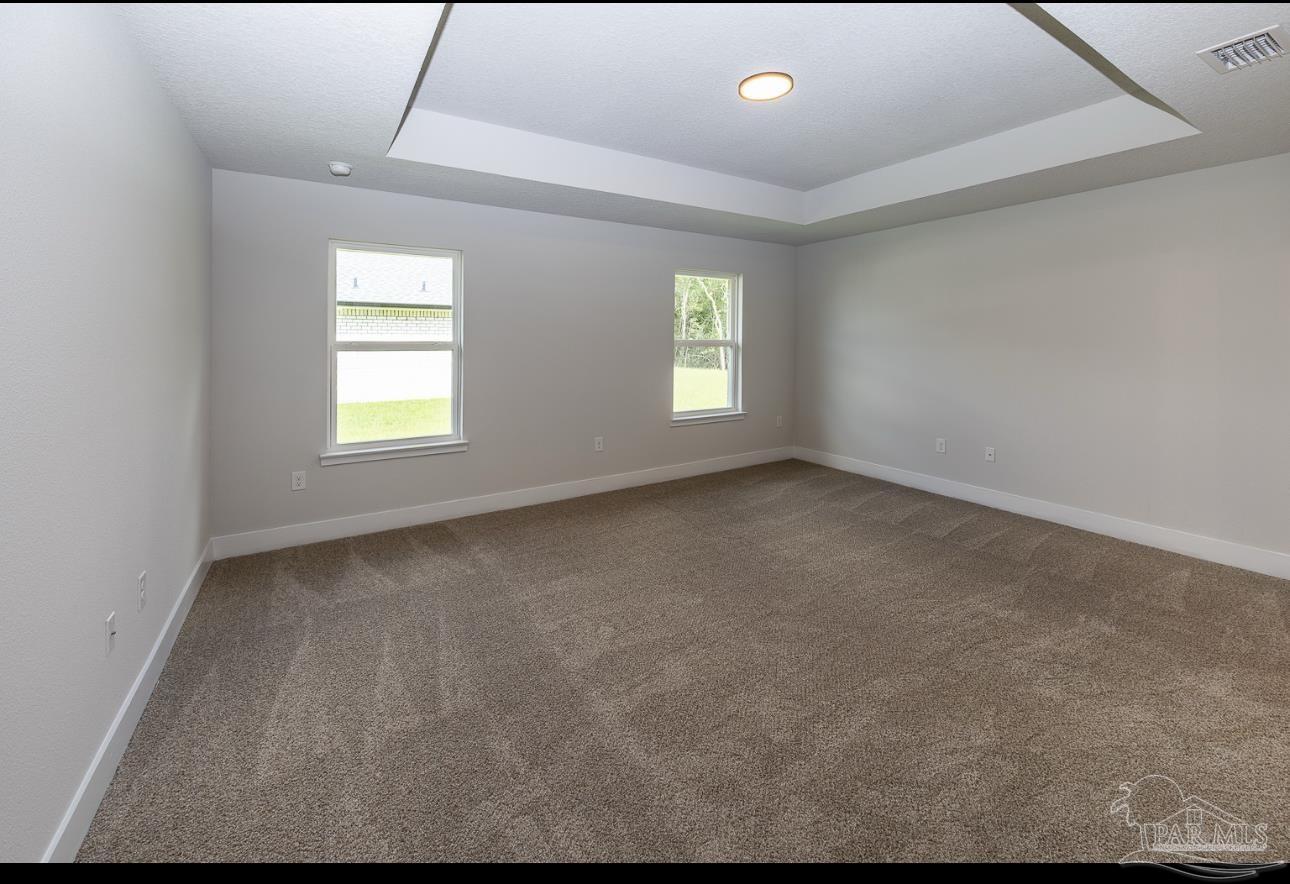 5303 Zenith Lane Milton, FL 32583 - Photo 16 of 16 an empty room with windows
