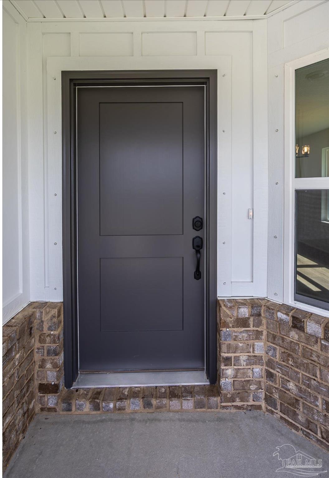 5303 Zenith Lane Milton, FL 32583 - Photo 4 of 16 a view of a door