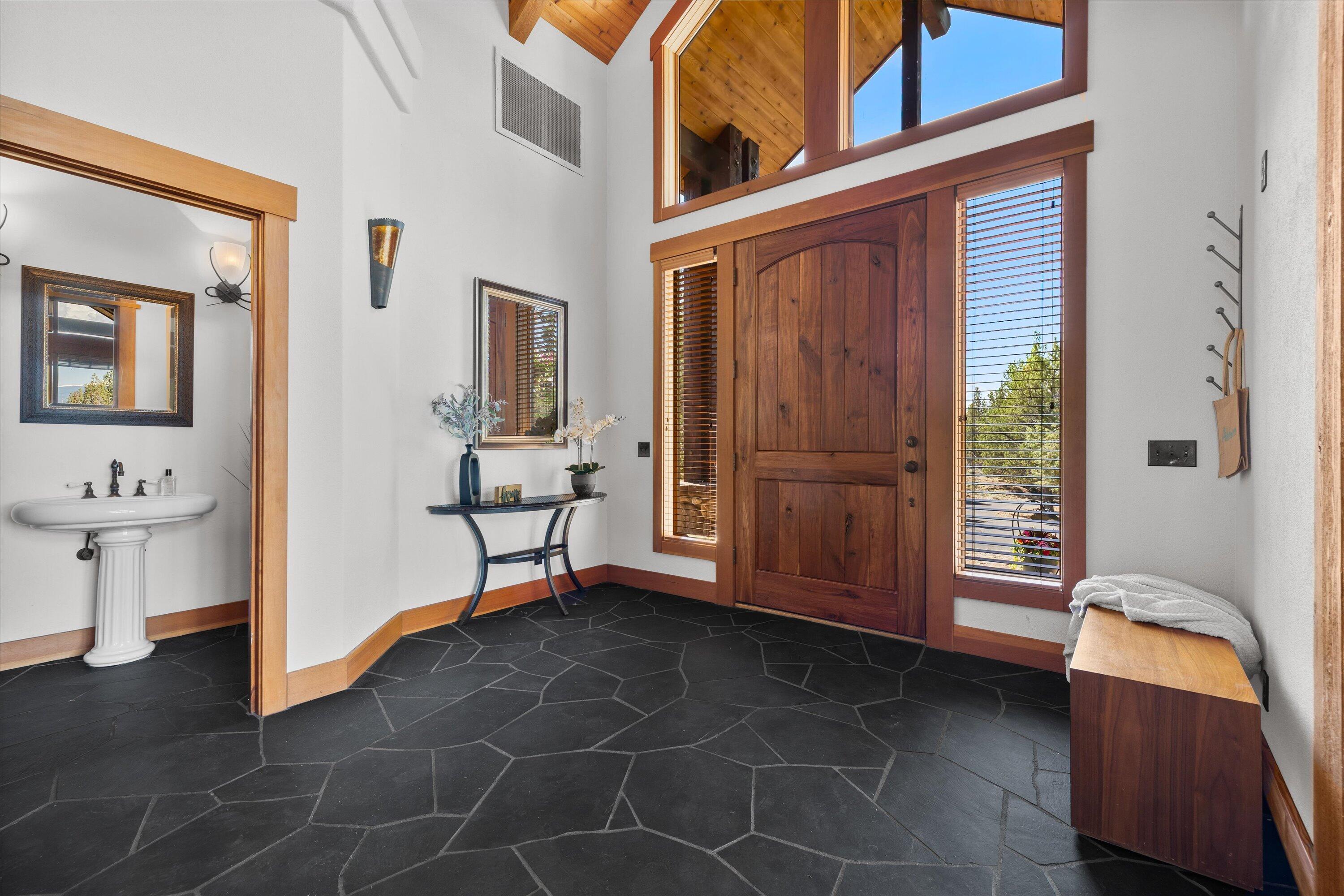 64155 Hunnell Road Bend, OR 97703 - Photo 8 of 96 Slate entry with half bath.