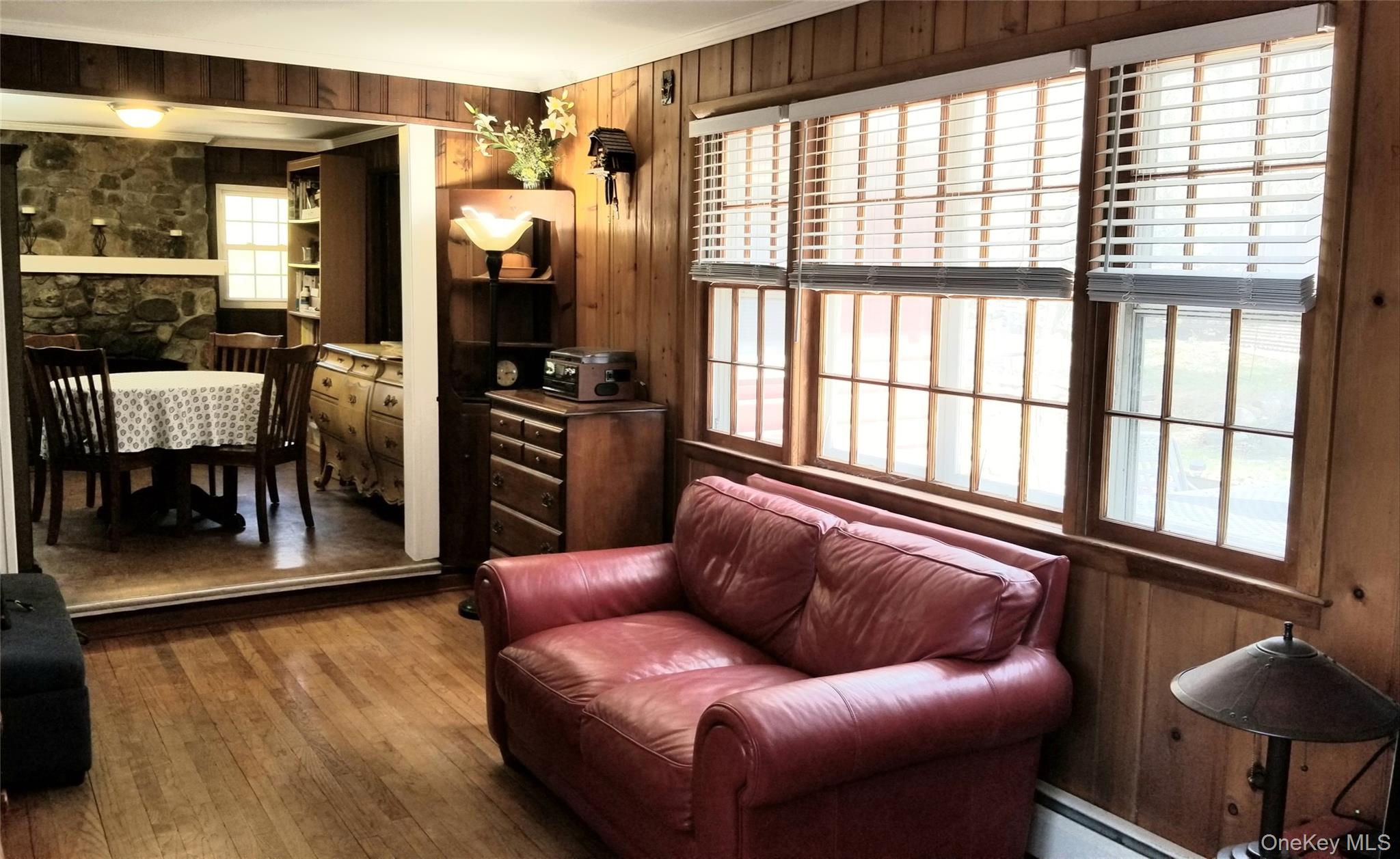3 Rodman Place Spring Valley, NY 10977 - Photo 4 of 10 a living room with furniture and a floor to ceiling window