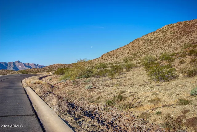 a view of a street with cars