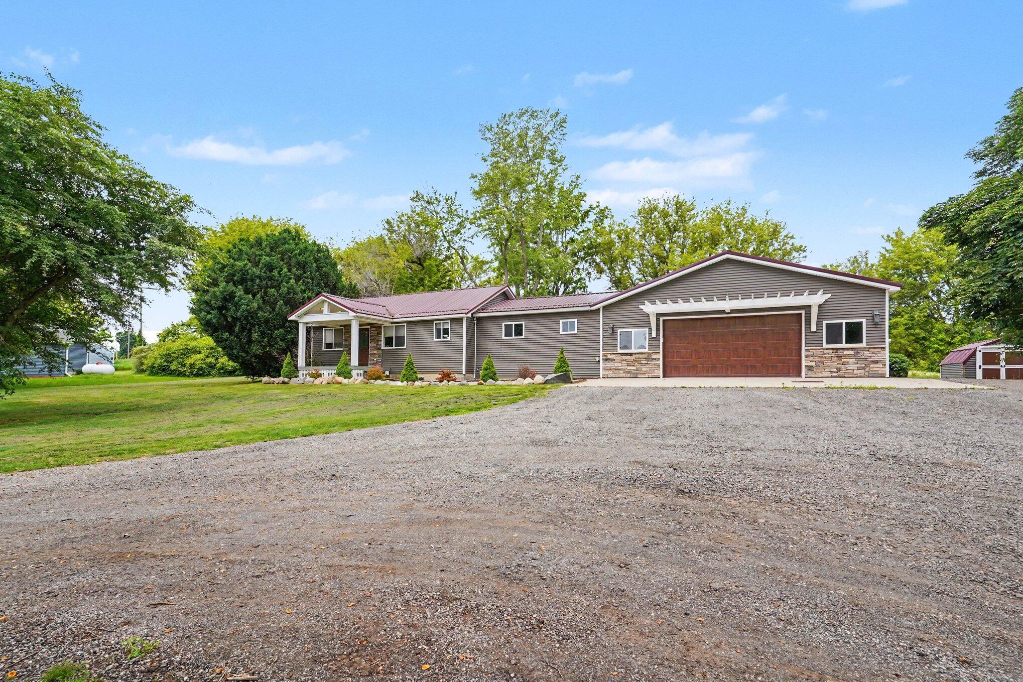6129 Old State Road North Branch, MI 48461 - Photo 3 of 29 004-Front Elevation ground level