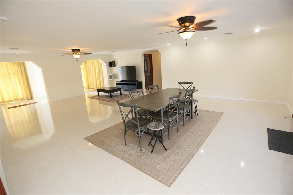 100 Circle Drive Pompano Beach, FL 33062 - Photo 6 of 30 a view of a dining room with furniture