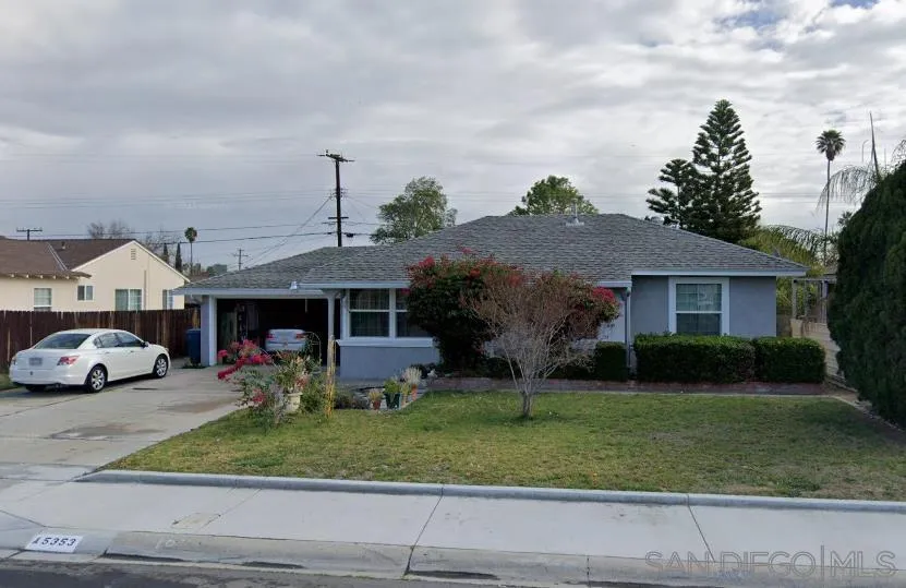 5353 Rutland Avenue Riverside, CA 92503 - Photo 1 of 1 a view of a car park in front of house