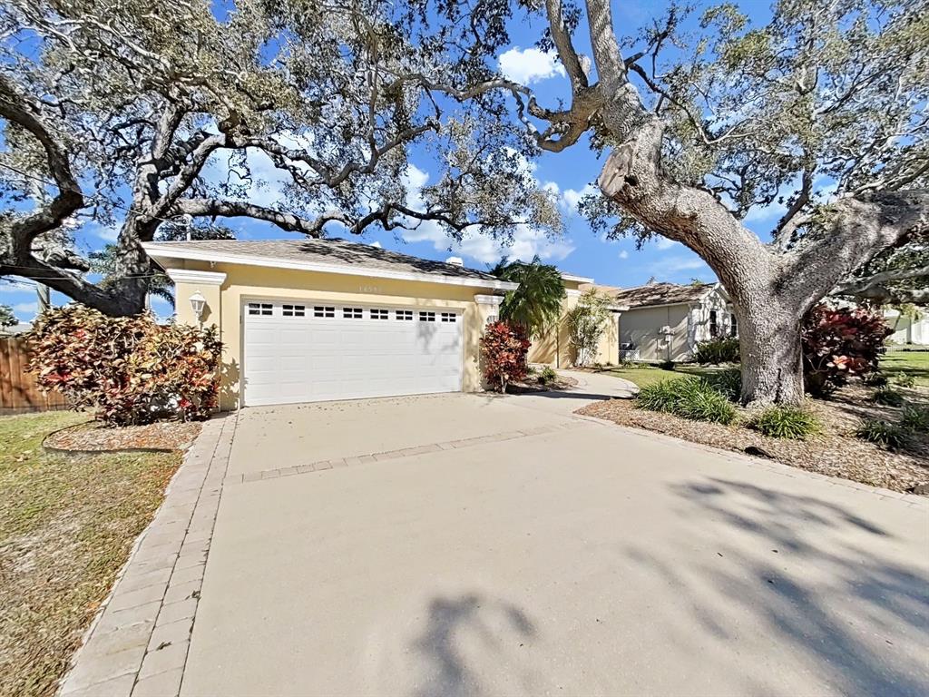 14595 Oliver Street Largo, FL 33774 - Photo 2 of 35 a view of street with sign board
