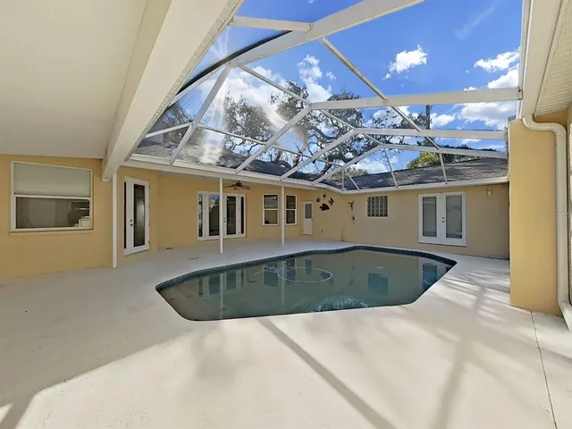 a view of a house with a swimming pool
