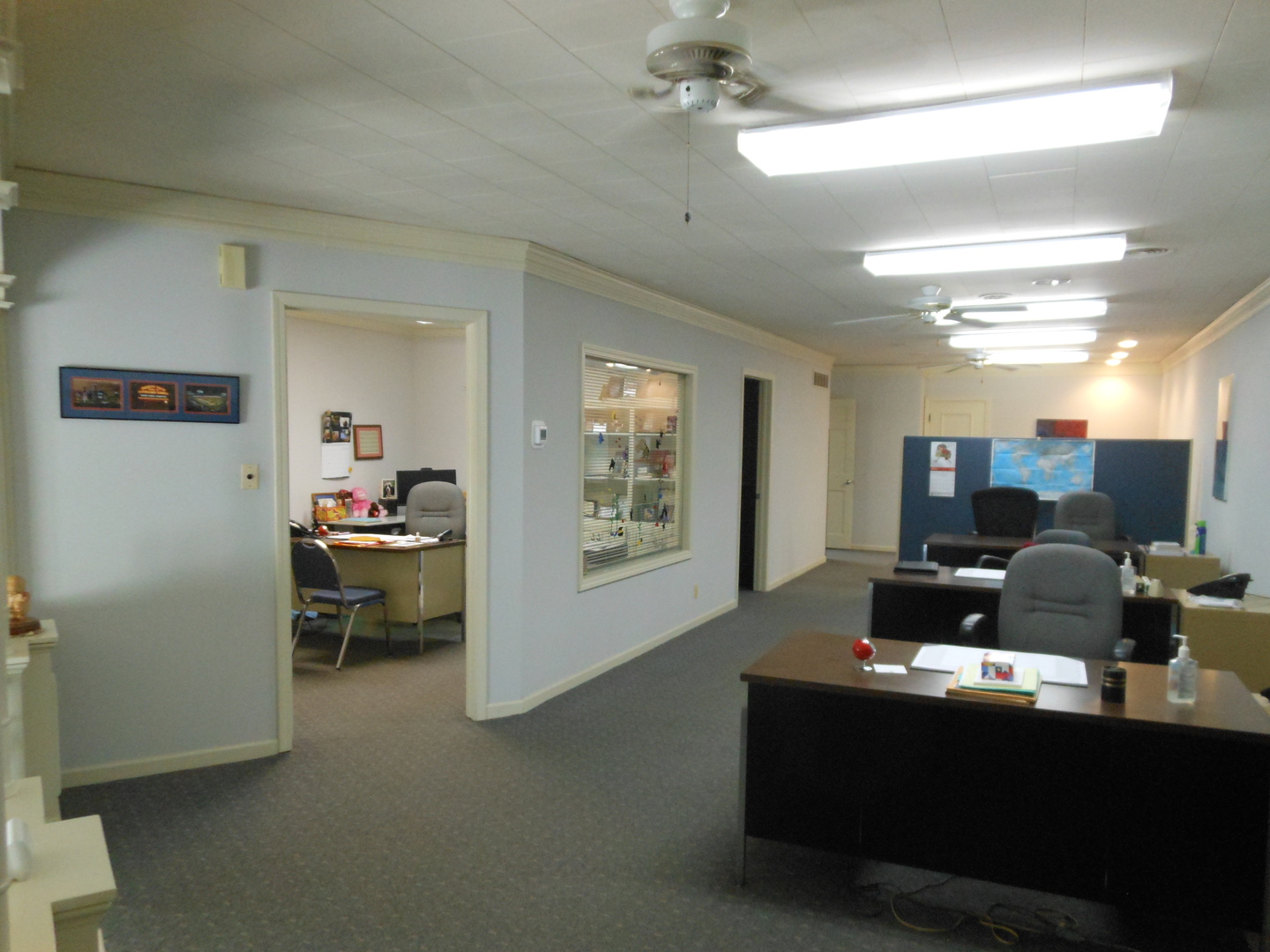918 Plainfield Road Joliet, IL 60435 - Photo 11 of 12 a living room with furniture and a flat screen tv