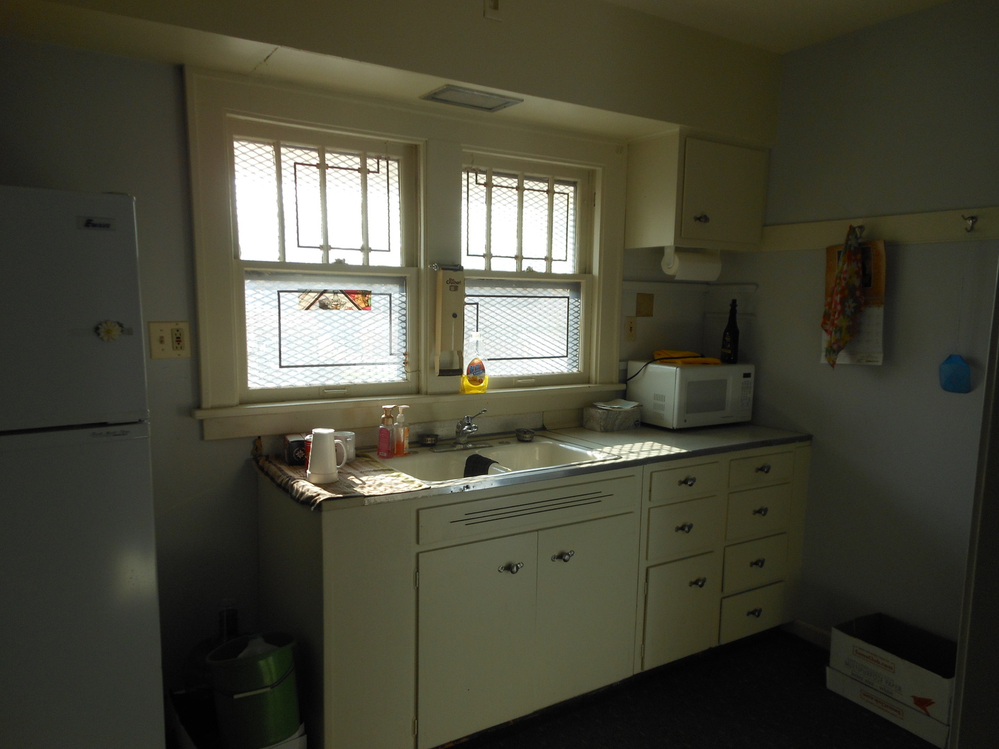 918 Plainfield Road Joliet, IL 60435 - Photo 12 of 12 a kitchen with a sink stove and window