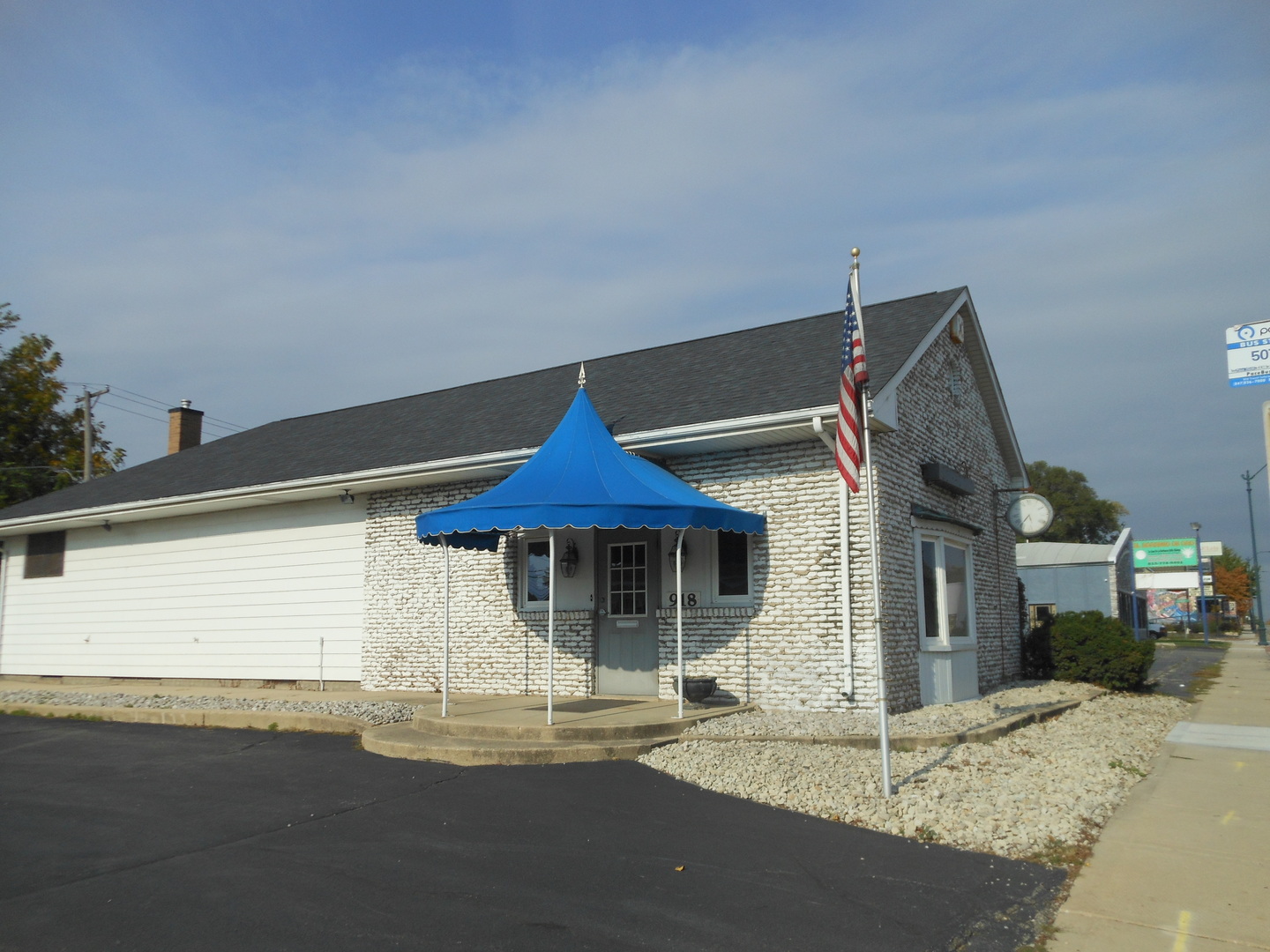 918 Plainfield Road Joliet, IL 60435 - Photo 3 of 12 a front view of a house with a yard