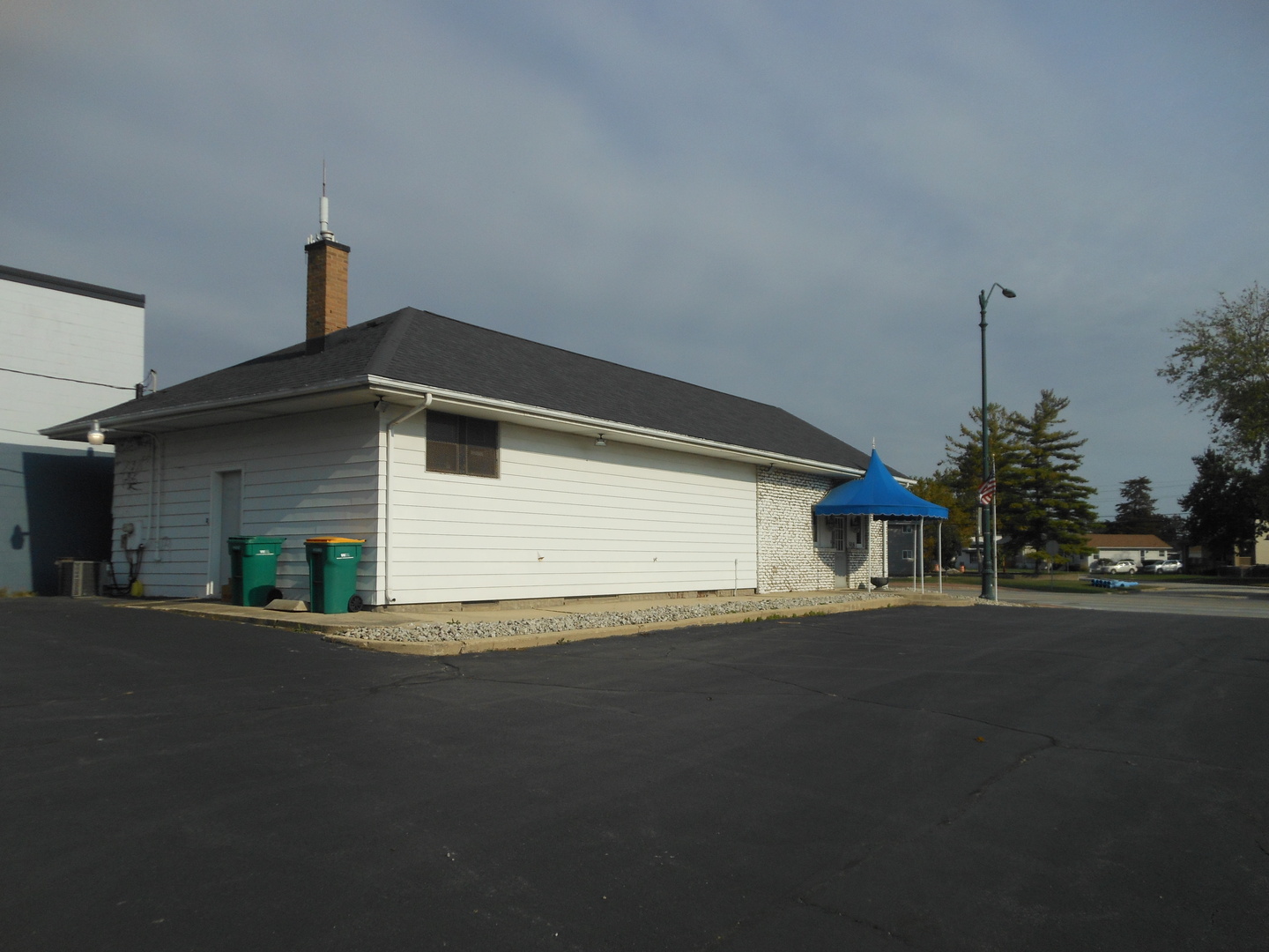 918 Plainfield Road Joliet, IL 60435 - Photo 5 of 12 a front view of a house with a street