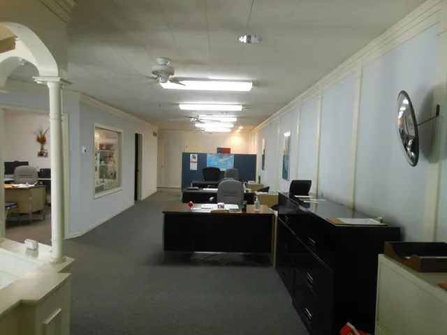 a view of a workspace with kitchen