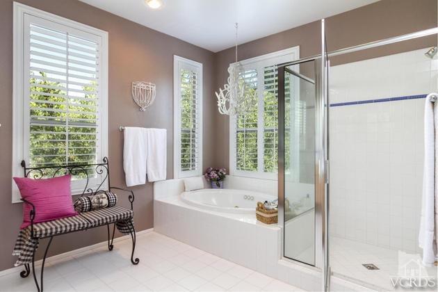 4349 Clearwood Road Moorpark, CA 93021 - Photo 17 of 35 a bathroom with a tub and shower