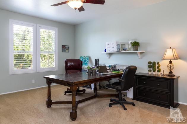 4349 Clearwood Road Moorpark, CA 93021 - Photo 21 of 35 a view of a workspace with furniture and a window