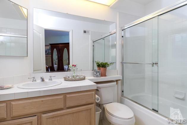 4349 Clearwood Road Moorpark, CA 93021 - Photo 25 of 35 a bathroom with a sink toilet and shower