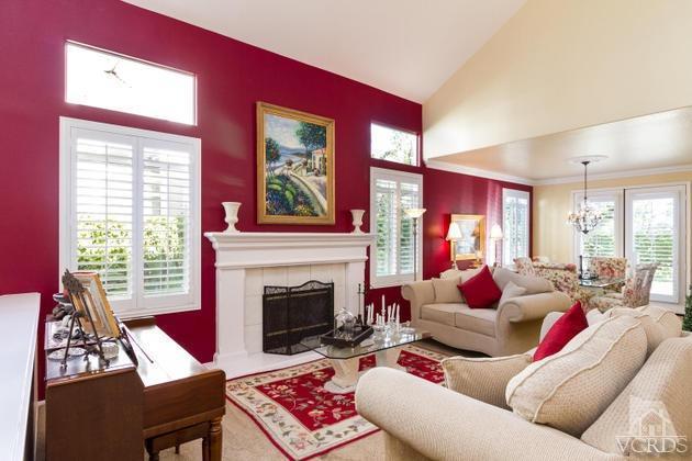 4349 Clearwood Road Moorpark, CA 93021 - Photo 4 of 35 a living room with furniture a flat screen tv and a fireplace