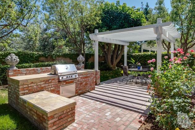 4349 Clearwood Road Moorpark, CA 93021 - Photo 31 of 35 a view of a patio with a chairs in patio