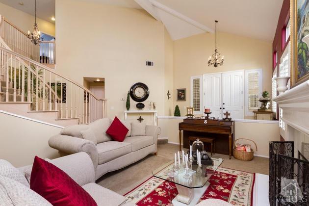 4349 Clearwood Road Moorpark, CA 93021 - Photo 6 of 35 a living room with furniture and a chandelier