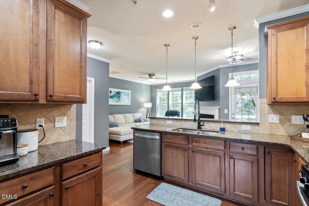 6224 Braidwood Court Raleigh, NC 27612 - Photo 14 of 39 a kitchen with lots of counter space and a sink