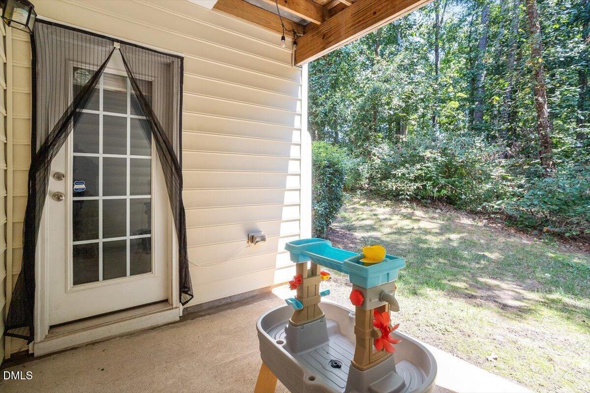6224 Braidwood Court Raleigh, NC 27612 - Photo 20 of 39 a view of entryway with hall