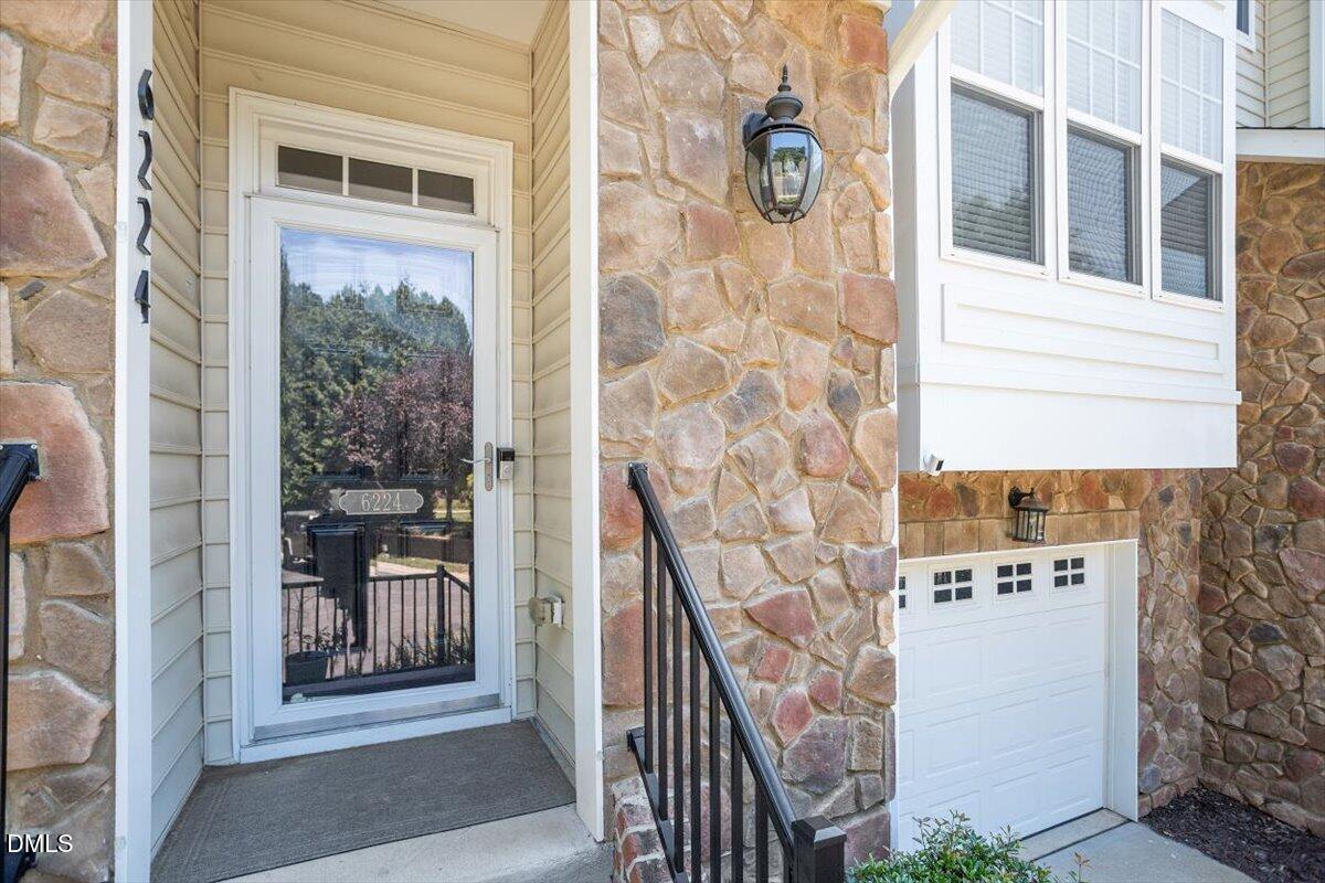6224 Braidwood Court Raleigh, NC 27612 - Photo 3 of 39 a view of front door of house