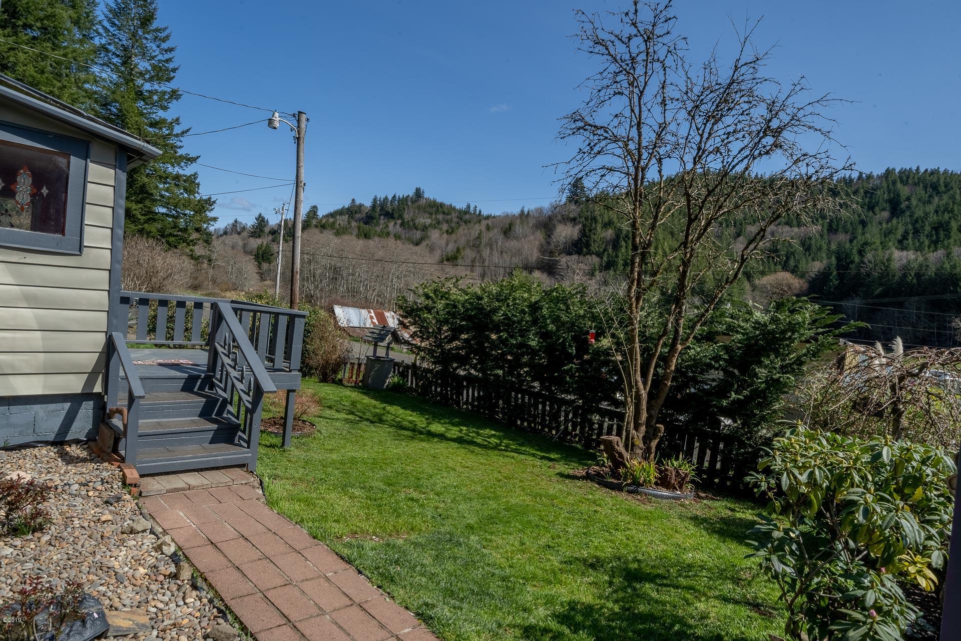 1346 Hidden Valley Road Newport, OR 97365 - Photo 7 of 23 Front yard