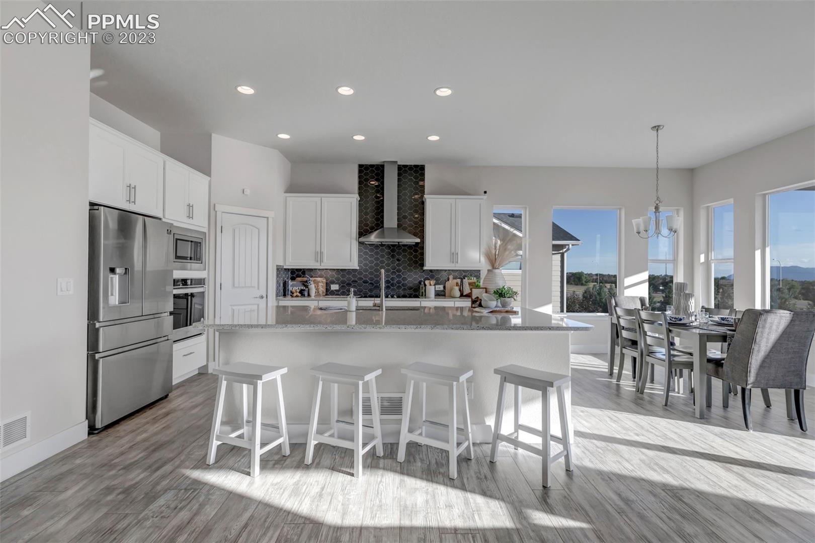 3259 Red Cavern Road Colorado Springs, CO 80908 - Photo 11 of 36 kitchen and dining room