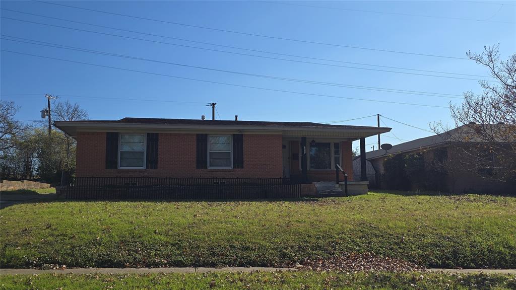 2018 Van Cleave Drive Dallas, TX 75216 - Photo 1 of 12 a view of a house with a yard