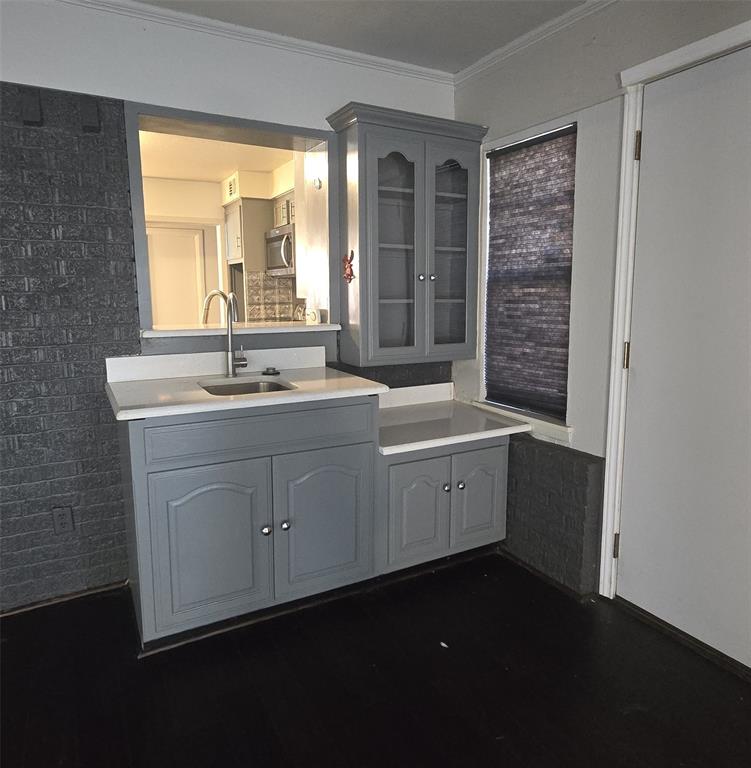 2018 Van Cleave Drive Dallas, TX 75216 - Photo 12 of 12 a room with a sink cabinets and a window